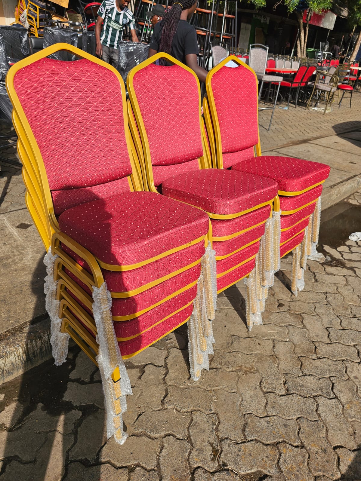 Red plastic chairs stacked